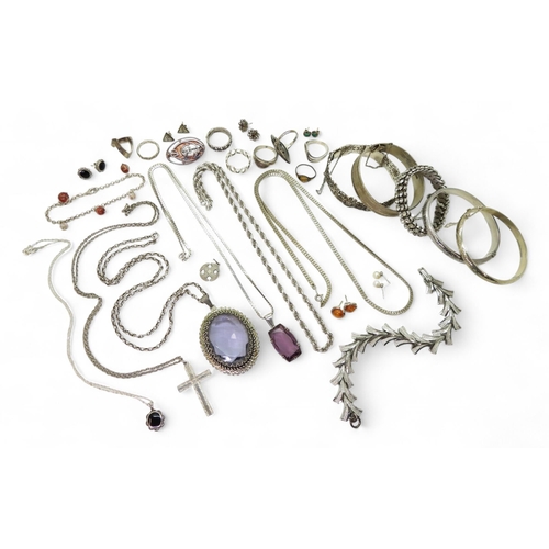 861 - Collection of silver and white metal jewellery, including bangles, rings, a Mackintosh style brooch,... 