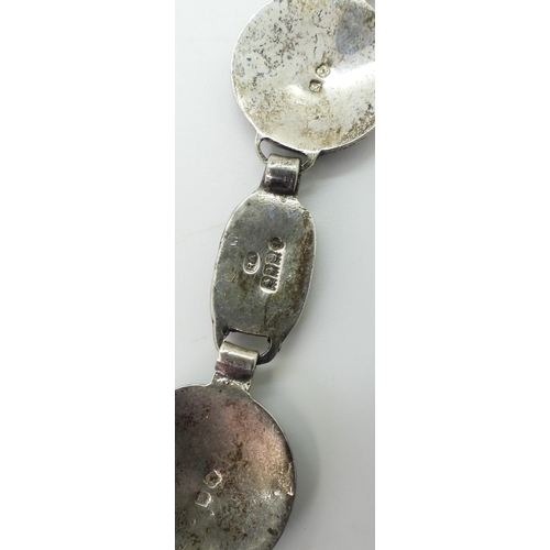 867 - A silver Viking boat bracelet, made by Robert Allison & Son, for Glasgow 1959, together with a p... 