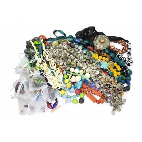 895 - A large collection of statement necklaces and beads, to include wood, glass, plastic, glass, vintage... 