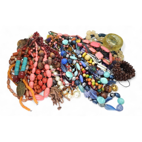 896 - A large collection of statement necklaces and beads, to include wood, glass, plastic, glass, vintage... 