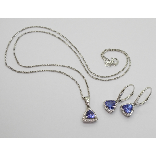 2760 - TANZANITE & DIAMOND SUITEset with trilliant cut tanzanites surrounded with brilliant cut diamond... 