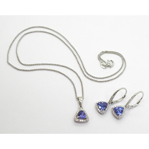 2760 - TANZANITE & DIAMOND SUITEset with trilliant cut tanzanites surrounded with brilliant cut diamond... 