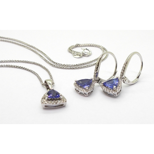 2760 - TANZANITE & DIAMOND SUITEset with trilliant cut tanzanites surrounded with brilliant cut diamond... 