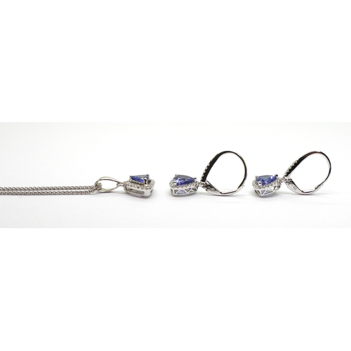 2760 - TANZANITE & DIAMOND SUITEset with trilliant cut tanzanites surrounded with brilliant cut diamond... 