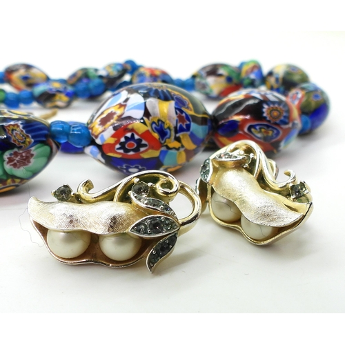 879 - Collection of vintage jewellery, including a silver Viking ring, millefiori beads, Trifari pea pod e... 