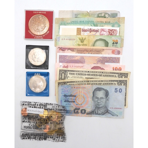 413 - A worldwide coin collection with banknotes to include Great Britain George VI, ElizabethII and an Ir... 