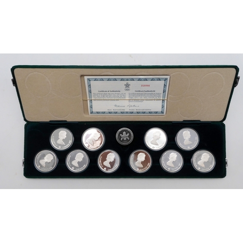 415 - ELIZABETH II (1952-2022)The Calgary Olympics 1988 Silver Coin Set 1985,1986 and 1987 cased with... 