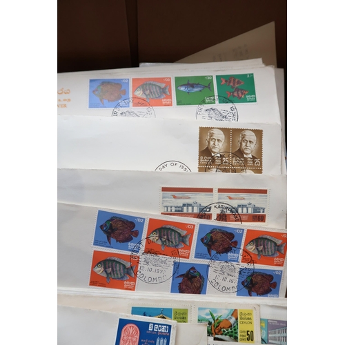 444 - India and Ceylon.A lot comprising first day covers dating from 1965 together with loose stamps and U... 