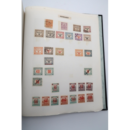 448 - An extensive worldwide stamp collection, mostly used, in 29 albums and a few stock books together wi... 