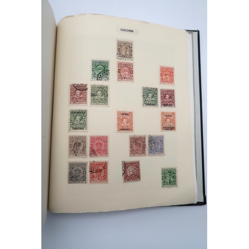 448 - An extensive worldwide stamp collection, mostly used, in 29 albums and a few stock books together wi... 