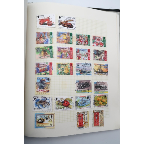 448 - An extensive worldwide stamp collection, mostly used, in 29 albums and a few stock books together wi... 