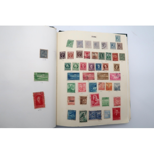 448 - An extensive worldwide stamp collection, mostly used, in 29 albums and a few stock books together wi... 