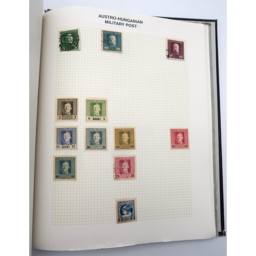 448 - An extensive worldwide stamp collection, mostly used, in 29 albums and a few stock books together wi... 