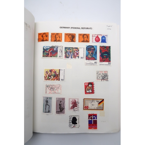 448 - An extensive worldwide stamp collection, mostly used, in 29 albums and a few stock books together wi... 