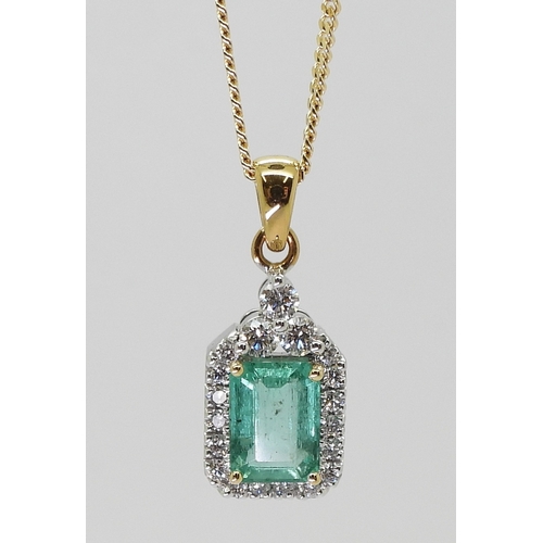 2772 - AN EMERALD PENDANTmade in 18k yellow and white gold, the step cut emerald is approx 8mm x 5.8mm x 3.... 