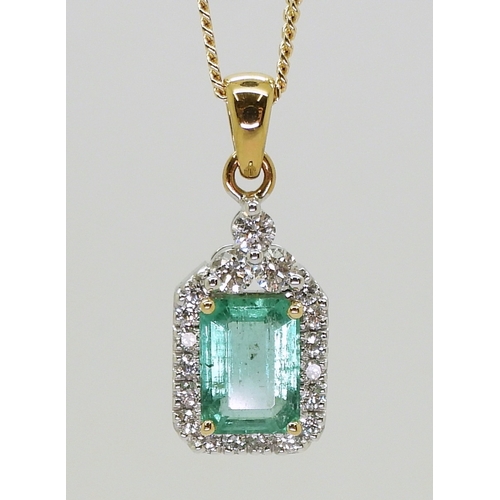 2772 - AN EMERALD PENDANTmade in 18k yellow and white gold, the step cut emerald is approx 8mm x 5.8mm x 3.... 