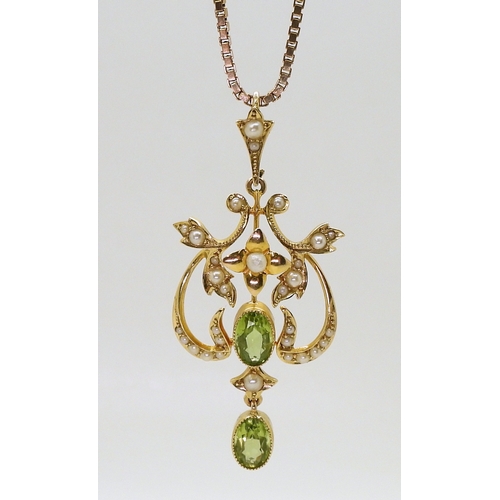 2773 - A PERIDOT SUITEcomprising of a 15ct gold Edwardian pendant set with peridot and pearls, weight 4.2gm... 