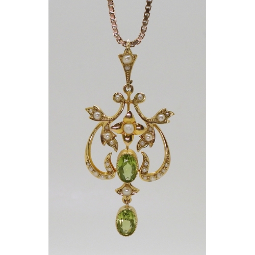 2773 - A PERIDOT SUITEcomprising of a 15ct gold Edwardian pendant set with peridot and pearls, weight 4.2gm... 