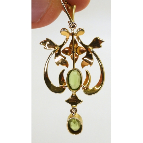 2773 - A PERIDOT SUITEcomprising of a 15ct gold Edwardian pendant set with peridot and pearls, weight 4.2gm... 