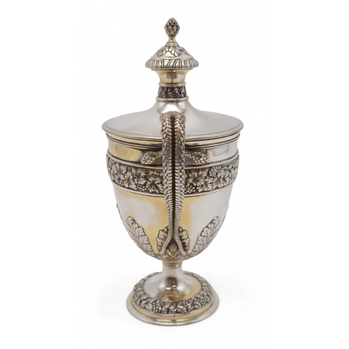 2535 - AN EDWARDIAN SILVER GILT TROPHY CUP AND COVERby James & William Deakin, London 1908, with a case... 