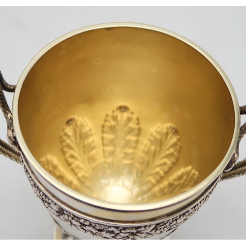 2535 - AN EDWARDIAN SILVER GILT TROPHY CUP AND COVERby James & William Deakin, London 1908, with a case... 