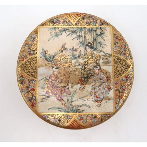 2432 - THREE SATSUMA BOXES AND COVERS An octagonal box painted with a lady and attendant in an interior, si... 