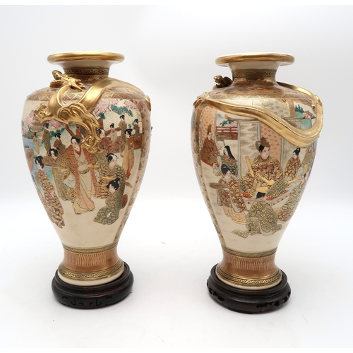 2438 - A LARGE KAGA VASE AND COVER Painted with panels of figures amongst diaper, trellis and scrolls, appl... 