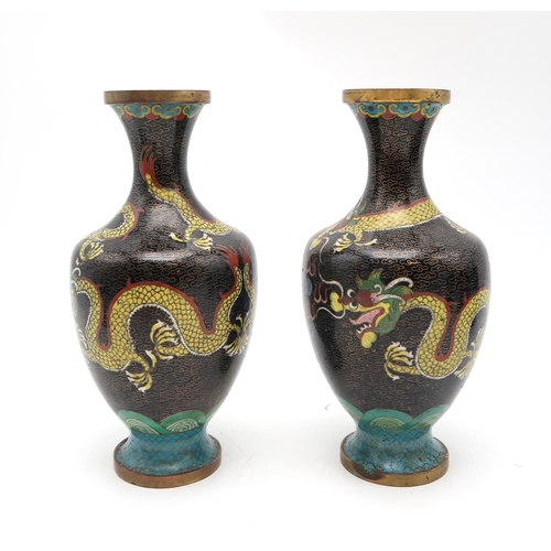 2442 - A PAIR OF JAPANESE CLOISONNE VASES Decorated with iris, 15.5cm high and a pair with dahlias, 15cm hi... 