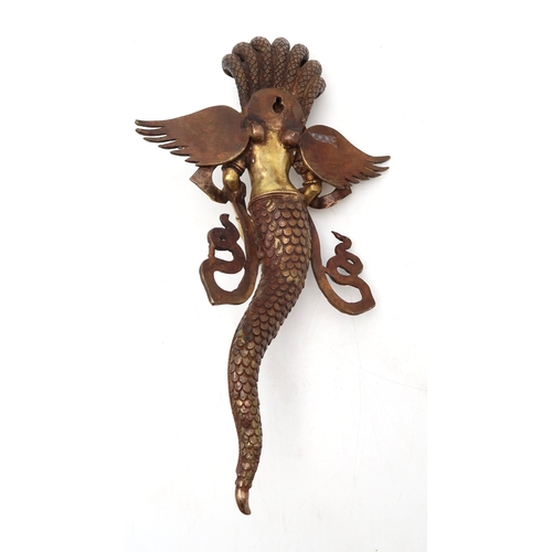 2452 - A BRASS NAAG KANYA WALL HANGING The snake Goddess holding a conch shell, 37cm high... 