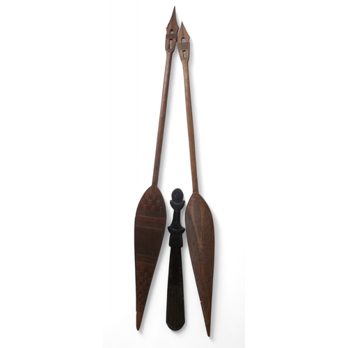 2453 - TWO SOUTH SEA ISLANDS PADDLES 140cm long and a Trobriand sword club, 63cm long (3)... 