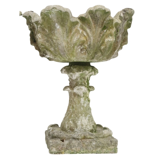 2027 - A PAIR OF 20TH CENTURY RECONSTITUTED STONE GARDEN PLANTERS with top basins moulded with acanthus lea... 