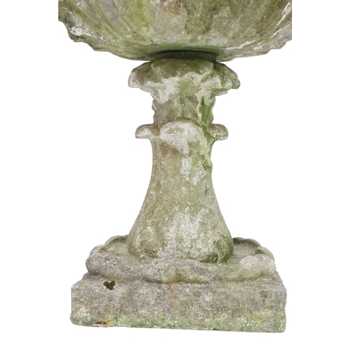 2027 - A PAIR OF 20TH CENTURY RECONSTITUTED STONE GARDEN PLANTERS with top basins moulded with acanthus lea... 