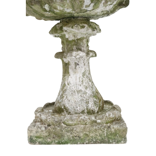 2027 - A PAIR OF 20TH CENTURY RECONSTITUTED STONE GARDEN PLANTERS with top basins moulded with acanthus lea... 