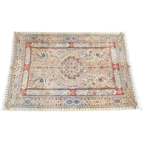 2152 - AN IVORY GROUND UNIQUE TABRIZ RUG with floral patterned central medallion and spandrels on flor... 