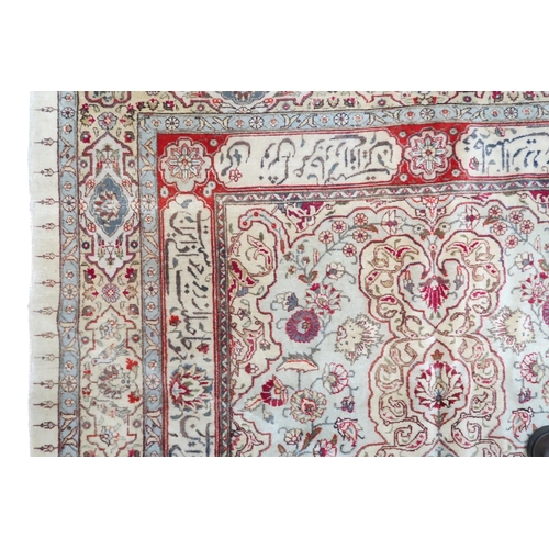 2152 - AN IVORY GROUND UNIQUE TABRIZ RUG with floral patterned central medallion and spandrels on flor... 