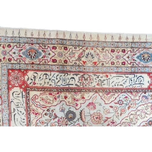 2152 - AN IVORY GROUND UNIQUE TABRIZ RUG with floral patterned central medallion and spandrels on flor... 