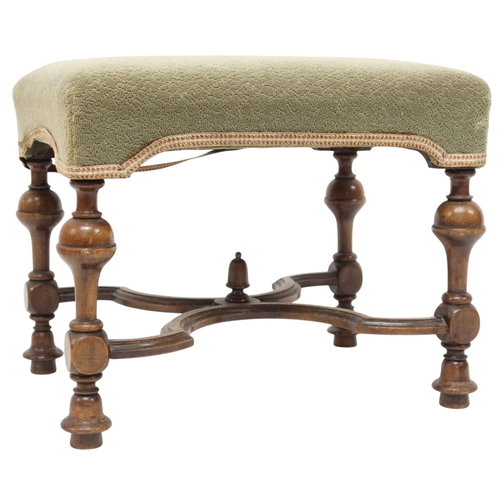 2030 - A 19TH CENTURY WALNUT FRAMED FOOTSTOOL with green upholstered top on turned baluster supports j... 