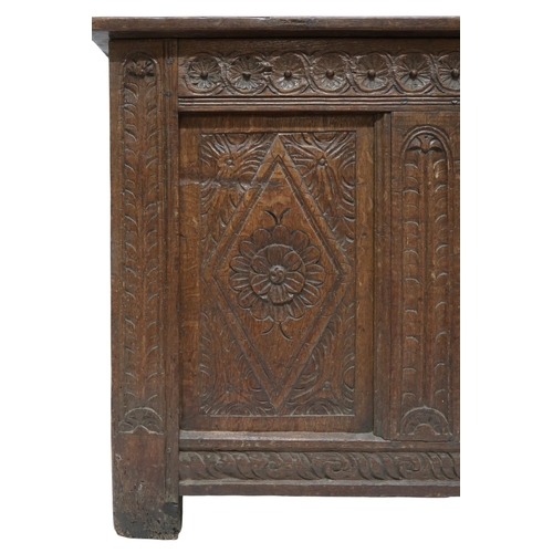 2032 - AN 18TH/19TH CENTURY OAK PANEL FRONT BLANKET CHEST rectangular panel top carved with diamond ca... 