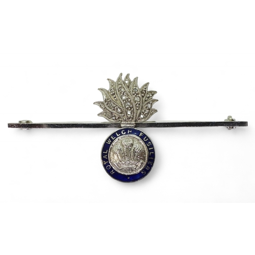 2617 - A ROYAL WELCH FUSILIERSbrooch in 18ct and 14ct white gold, the flames are set with rose cut diamonds... 