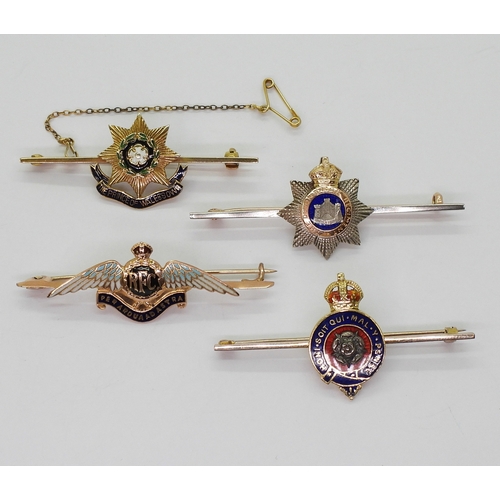 2619 - FOUR MILITARY BROOCHESan 18ct gold Royal Fusiliers brooch enamelled in blue and red, with central wh... 