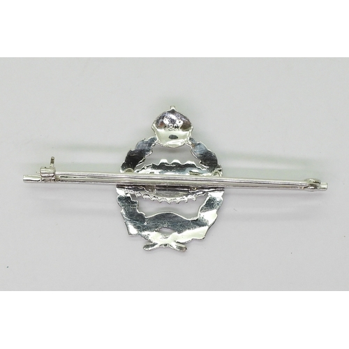 2620 - A ROYAL TANK REGIMENT SWEETHEART BROOCHmade in 18ct and 14ct white gold and set with a baguette and ... 