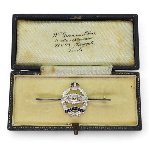 2620 - A ROYAL TANK REGIMENT SWEETHEART BROOCHmade in 18ct and 14ct white gold and set with a baguette and ... 