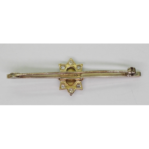 2621 - A COLDSTREAM GUARDS BROOCHthe yellow and white metal brooch is mounted with an eight pointed star se... 