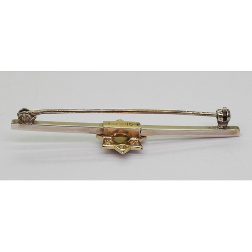 2621 - A COLDSTREAM GUARDS BROOCHthe yellow and white metal brooch is mounted with an eight pointed star se... 