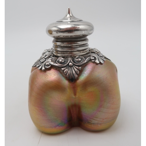 2260 - LOUIS COMFORT TIFFANY (AMERICAN, 1848-1933)An iridescent silver mounted scent bottle, an iridescent ... 