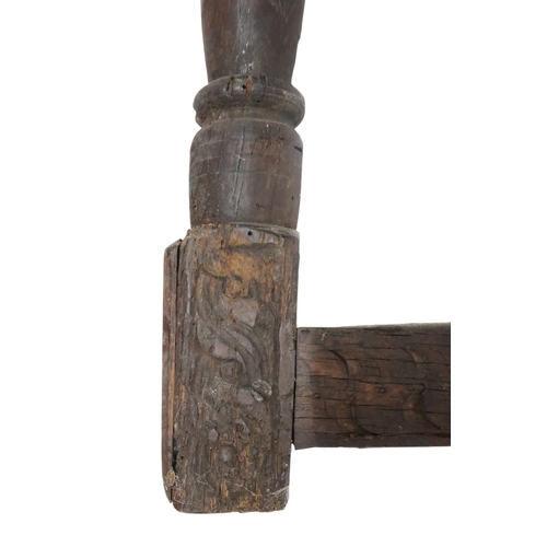 2035 - AN 18TH CENTURY OAK JOINTED STOOL with rectangular top on turned supports joined by carved frie... 