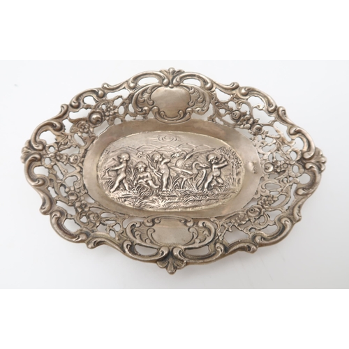 363 - A German silver dish, 800, decorated with cherubs, with openwork border, and a set of silver spoons,... 