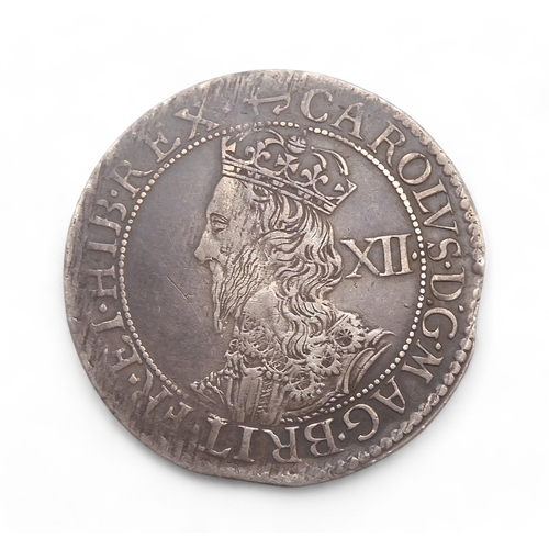 2557 - CHARLES I (1625-1649) 1 SHILLING BRIOT'S LATE BUSTObverseCrowned portrait of King Charles I left, de... 