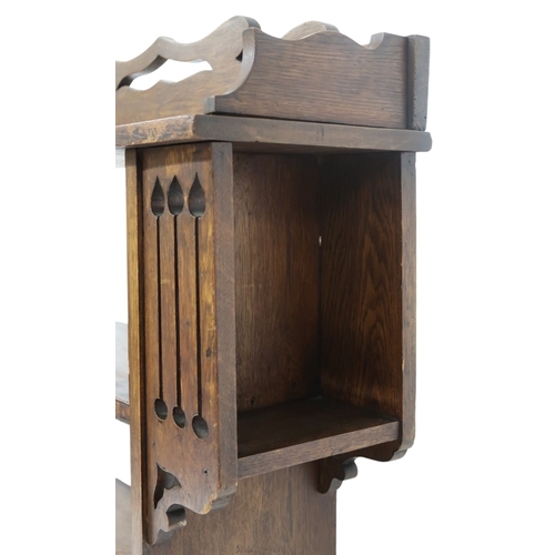 2043 - A LATE 19TH CENTURY OAK ARTS & CRAFTS OPEN BOOKCASE with pierced shaped gallery top over fo... 