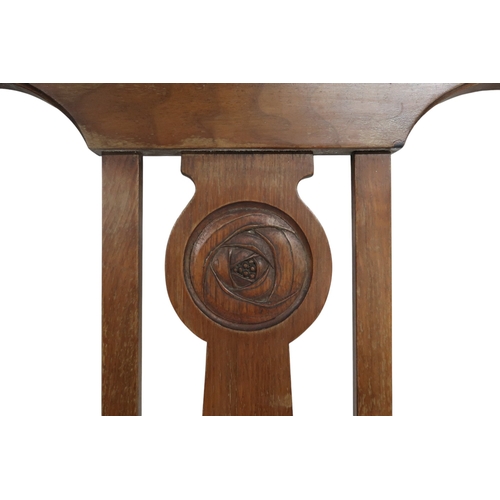 2046 - AN EARLY 20TH CENTURY MAHOGANY SINGLE HEAD AND FOOTBOARD each with arched slatted back with cen... 